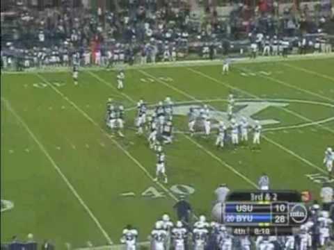 chad-lewis-plugs-book-during-byu-vs.-utah-state-game-2009
