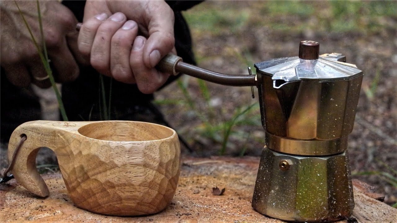 Metal Coffee Maker on an Open Fire in Nature. Making Coffee Stock