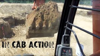 Excavator In Cab views Hitachi 370 Digging a large foundation