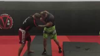 Double Wrist Lock to a Far Side Hip Toss