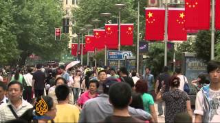 China pledges bigger role for free market