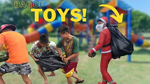 Giving a BAG OF TOYS to Kids for Christmas