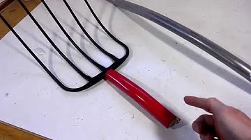 Pitchfork with curved handle