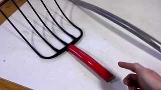 Pitchfork with curved handle