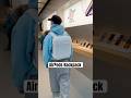 Wearing AirPods Backpack In an Apple Store