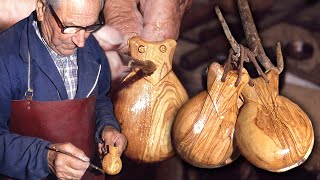 Castanets hand carved from a piece of wood. This is how this musical instrument is made