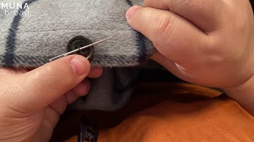 Sewing buttons with a thread shank