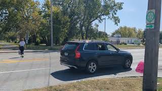 Shocking Video D: IL Prairie Path Users Cross Mannheim Rd. Intersection without Traffic Signals