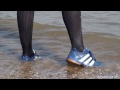 Valerie showing off her wet Adidas sneakers