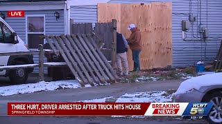Police: 3 injured, driver arrested after car crashes into Springfield Township home