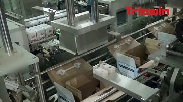 Dây chuyền  đóng thùng hộp sữa có quai sách.