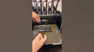 Prusa XL printing a single object using a combination of PLA, TPU, and PETG materials