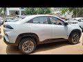 TATA currv ev accomplished x55 pure grey colour explain variant features and interior or exterior.