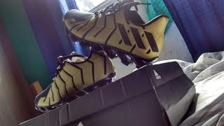 springblade preto e dourado