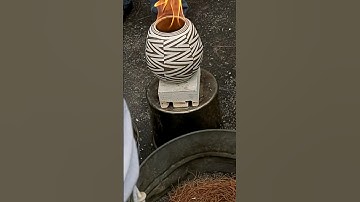 Make a Raku fired vase with red terra sigillata