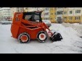Мини-погрузчик чистит снег в Белгороде на spetskran40.ru