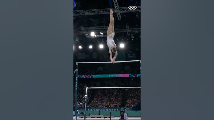 Kaylia Nemour wins gold for Algeria in the women's uneven bars with a score of 15.700!
