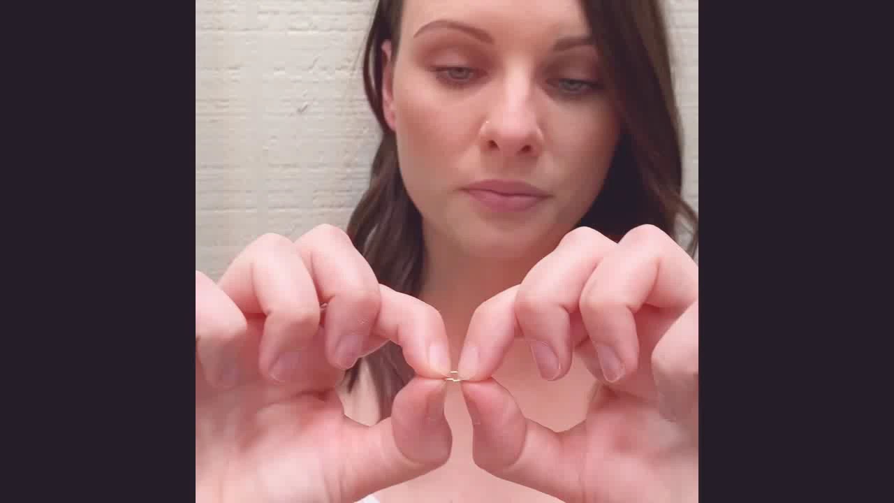 How to put in continuous hoop earrings. YouTube