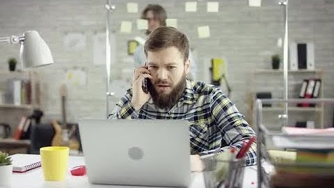 Developer Talks On Smartphone Stock Video