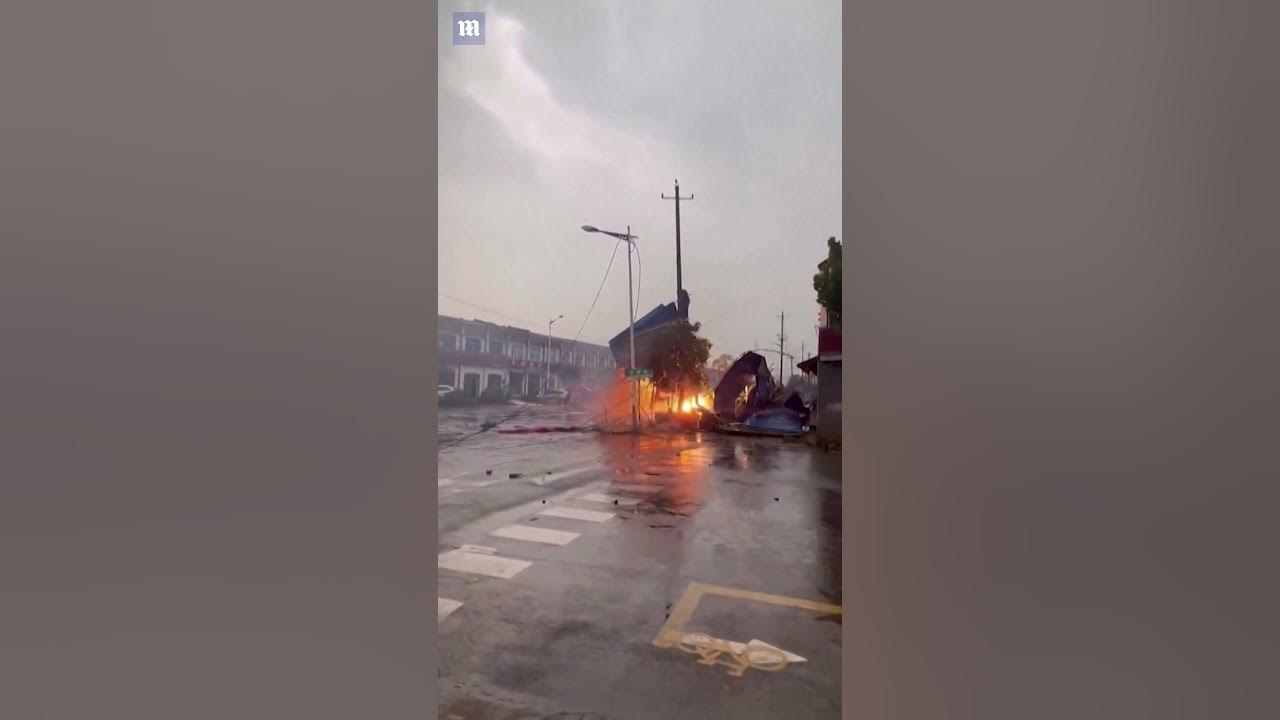 Violent tornado rips through eastern China leaving debris flying through the air