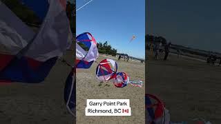 Colorful kites dance at Garry Point Park Richmond, BC.#Canada #FYP #Travel #Summer #Viral