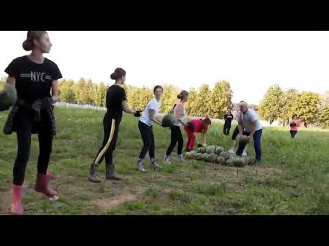 Lukashenko having fun with watermelons, girls