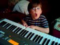 Noah having fun on his nanas keyboard