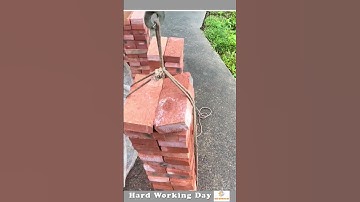 The Process Of Shifting Bricks With A Drone