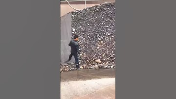 Unloading sand and gravel from cargo ships - Good tools and machinery make work easy