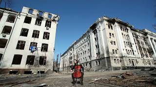 A cellist performs on the street in front of the ruins of his city Kharkiv!  War in Ukraine 2022