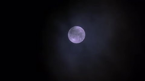 Clouds Passing Under Full Moon Stock Video