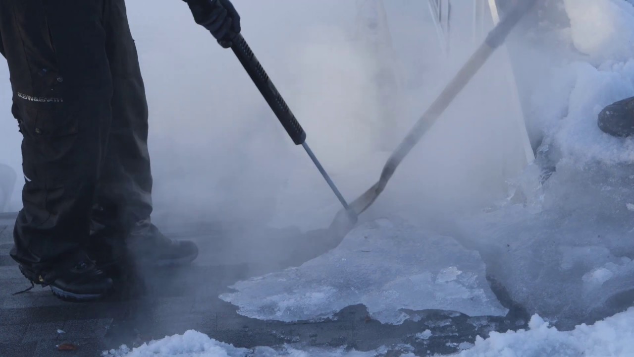 Slade Roofing ice dam removal Jackson Wyoming - YouTube