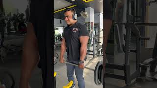 Standing Barbell shrug.                              fitness gym model video motivation trend