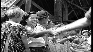 US soldiers greeted in the Town of Milly, France, during World War II. HD Stock Footage