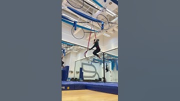 Acrobat is training on aerial loops!