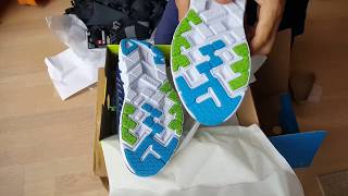 Распаковка: кроссовки Hoka, рюкзак Puma, тренировочные брюки Nike.
