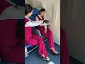 why is the air hostess smelling the shoe !