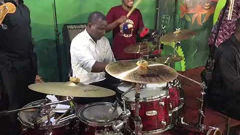 minister Francis Amo is on drums. check out
