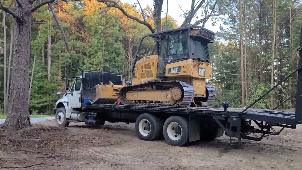 House overgrown by trees and Saving the house. Bulldozer Works Abbeville SC 