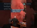 Albanian opposition protests budget in parliament with smoke flares and fire #albania #politics