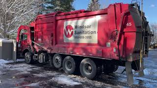 Windsor Sanitation Front Loader Slamming the Trash Dumpster at a Holiday Inn Express