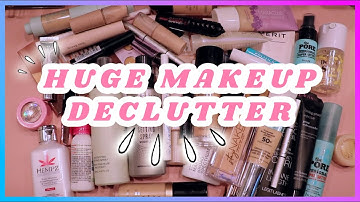 HUGE MAKEUP DECLUTTER 2022! | FOUNDATIONS, SETTING SPRAYS & MORE! | JEBeauty
