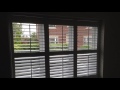 Shutter blinds with a midrail in burntwood