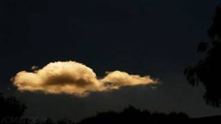 Small cumulus clouds forming in passing airstream timelapse HD V09654