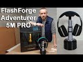 Un support de casque 3d en forme de prise jack gante avec la flashforge adventurer 5m pro