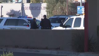 Officer shoots man wielding gun and carrying baby in Phoenix