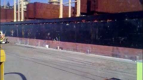 unloading logs from log truck 2