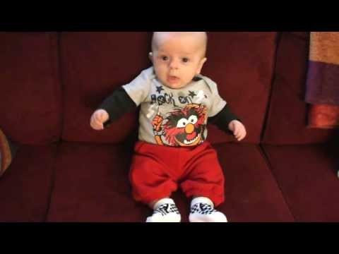 Baby sneezes and falls over