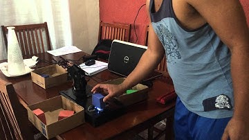 Braço mecânica Automatizada usando um controlador Arduino guiado por um Sensor de Cor RGB