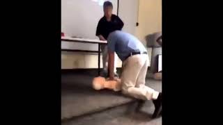 guy slaps cpr doll